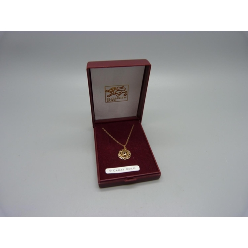 1004 - A yellow metal Millennium 2000 necklace, 0.9g