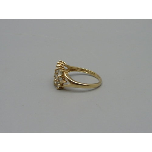 1011 - A 9ct gold and cubic zirconia ring, 2.5g, N