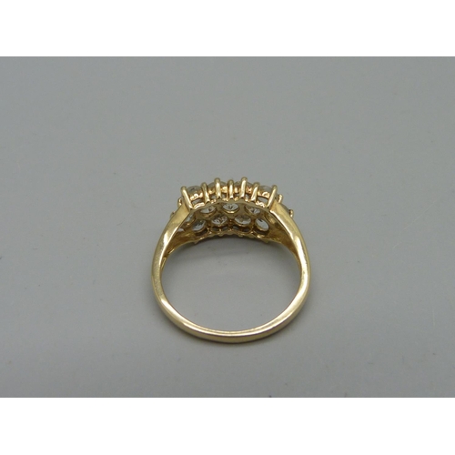 1011 - A 9ct gold and cubic zirconia ring, 2.5g, N