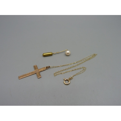 1012 - A 9ct gold cross pendant on chain, 2.4g, and a hallmarked 9ct gold and pearl stick pin, 0.7g