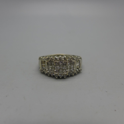 1022 - A 14ct white gold and diamond ring, set with 53 diamonds, 7.3g, R