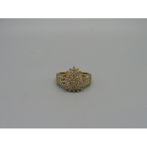 1026 - A 9ct gold and diamond ring, 4.5g, Q