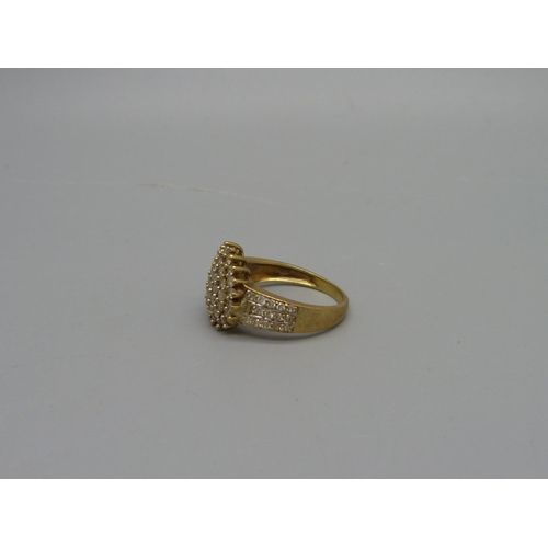 1026 - A 9ct gold and diamond ring, 4.5g, Q