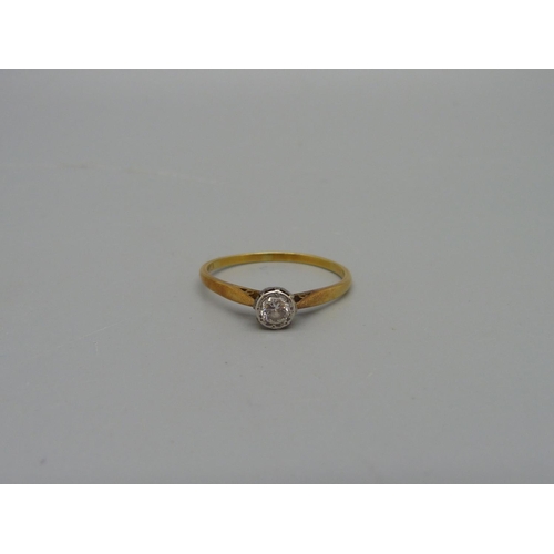 1027 - A yellow metal and diamond ring, 1.9g, S