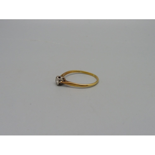 1027 - A yellow metal and diamond ring, 1.9g, S