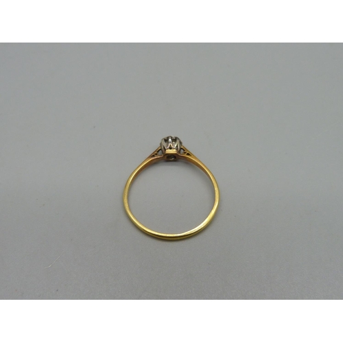 1027 - A yellow metal and diamond ring, 1.9g, S