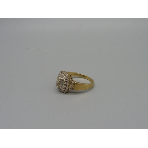 1028 - A 9ct gold and diamond ring, 4.2g, Q