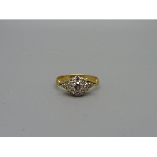 1029 - An 18ct gold and diamond ring, 3.1g, P