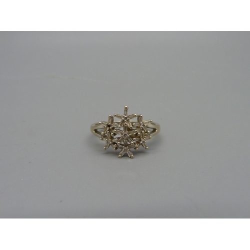 1030 - A 9ct white gold and diamond ring, lacking one stone, 3.7g, R