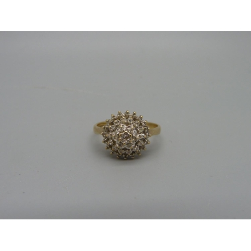 1031 - A 9ct gold and diamond ring, 3.5g, T