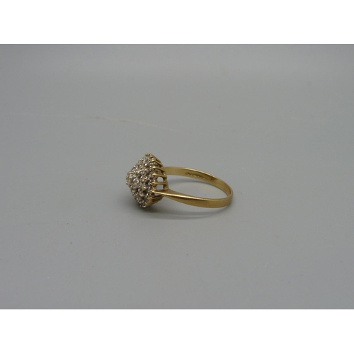 1031 - A 9ct gold and diamond ring, 3.5g, T