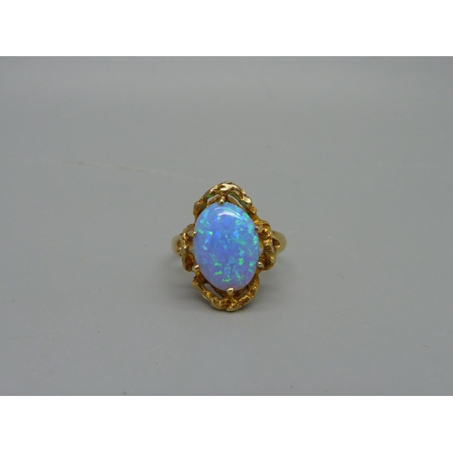 1035 - A 14ct gold and synthetic opal ring, 3.9g, O