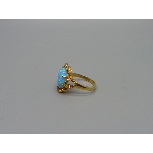 1035 - A 14ct gold and synthetic opal ring, 3.9g, O