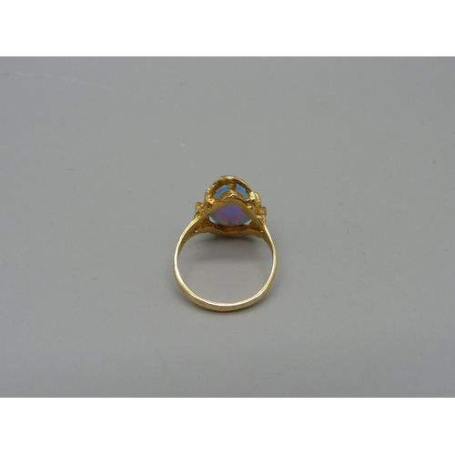 1035 - A 14ct gold and synthetic opal ring, 3.9g, O