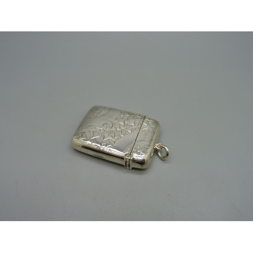 1037 - A silver vesta case, Birmingham 1899