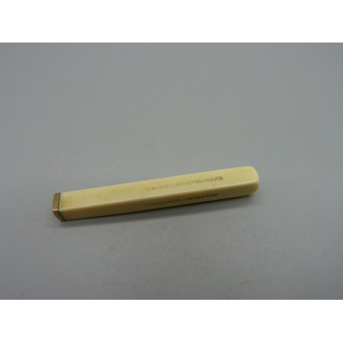 1038 - An ivory and gold toothpick by Sampson Morden & Co., 'T.C. Palmer-Inventor'