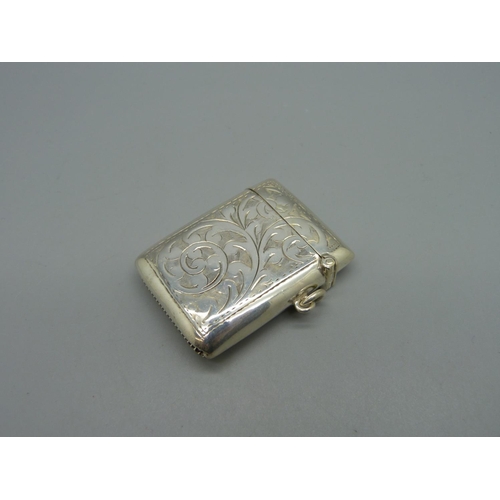 1041 - A silver vesta case, Birmingham 1919