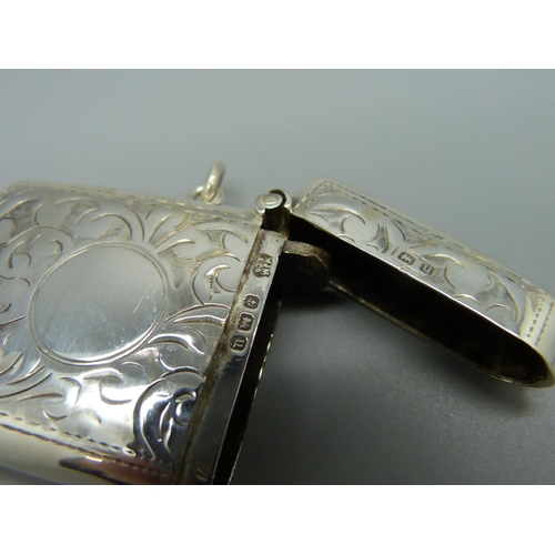 1041 - A silver vesta case, Birmingham 1919