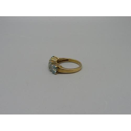 1050 - A silver gilt, spinel and zircon ring, N