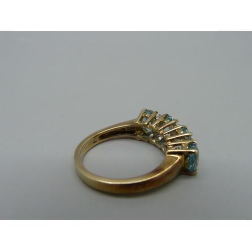 1050 - A silver gilt, spinel and zircon ring, N