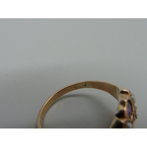 1053 - A yellow metal, amethyst and pearl ring, marked 9K, 3g, O