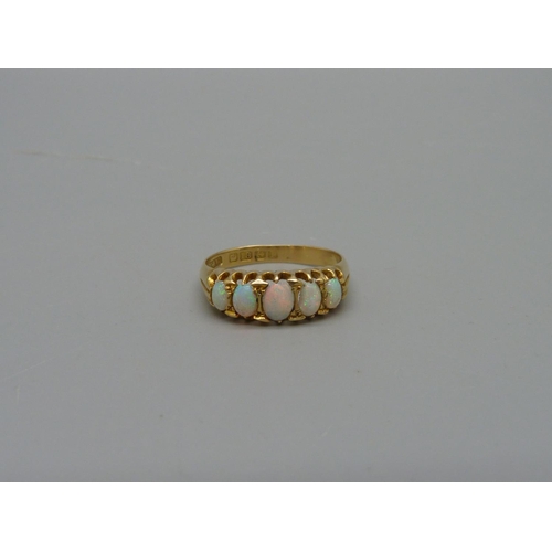 1067 - A Victorian 18ct gold, five stone opal ring, Birmingham 1864, 2.7g, K, one opal a/f