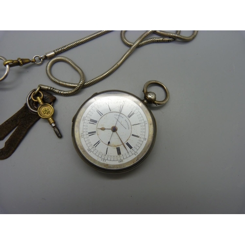 1081 - A silver pocket watch with key and a silver centre seconds chronograph pocket watch