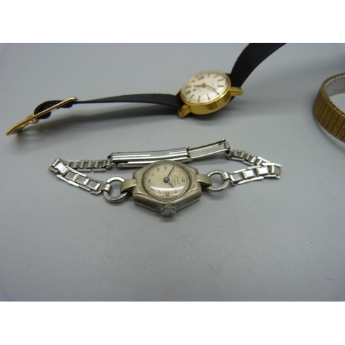 1086 - Two lady's Omega wristwatches and one Girard-Perregaux