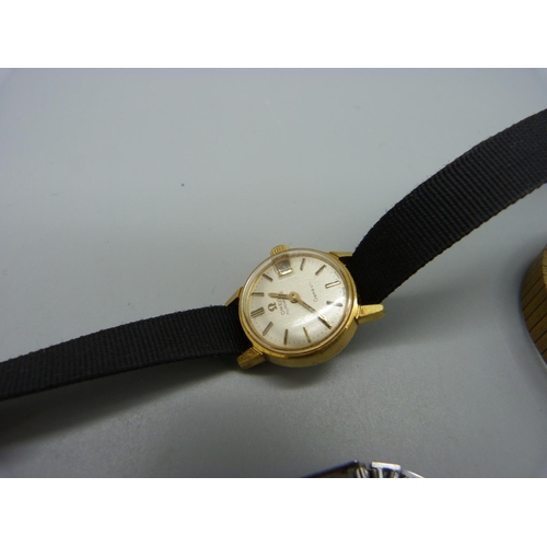 1086 - Two lady's Omega wristwatches and one Girard-Perregaux