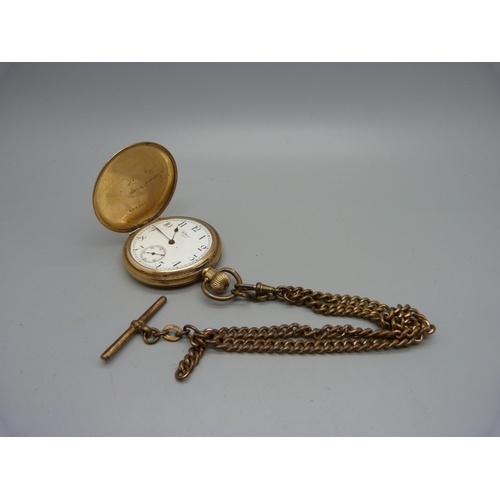 1087 - A Waltham pocket watch and plated Albert chain