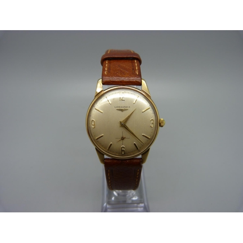 1090 - A 9ct gold Longines wristwatch, 32mm case