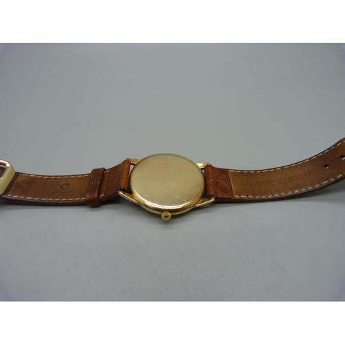 1090 - A 9ct gold Longines wristwatch, 32mm case