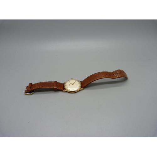 1090 - A 9ct gold Longines wristwatch, 32mm case