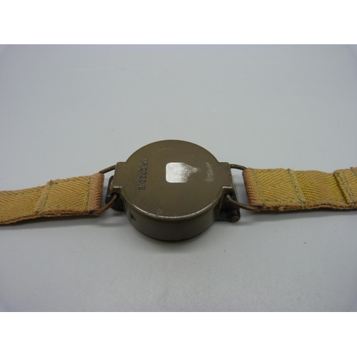 1096 - A wrist-compass, marked No.10730/B