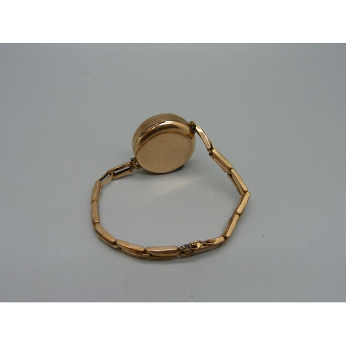 1099 - A lady's rolled gold Medana wristwatch