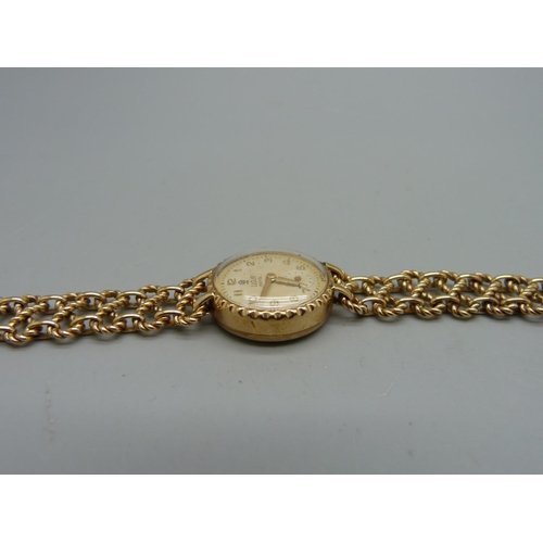 1100 - A lady's 9ct gold Tudor Royal wristwatch on a 9ct gold bracelet strap marked Rolex, total weight 21.... 