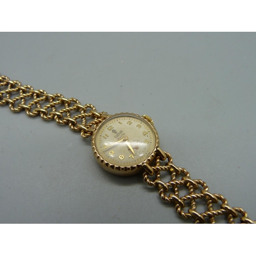 1100 - A lady's 9ct gold Tudor Royal wristwatch on a 9ct gold bracelet strap marked Rolex, total weight 21.... 