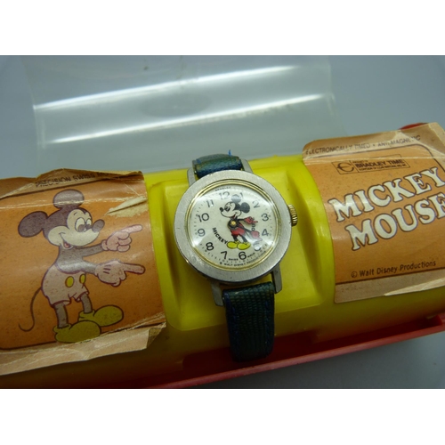 1104 - A Mickey Mouse wristwatch, with plastic case marked Product of Bradley Time