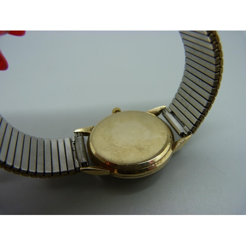 1118 - A 9ct gold Omega wristwatch, 33mm case