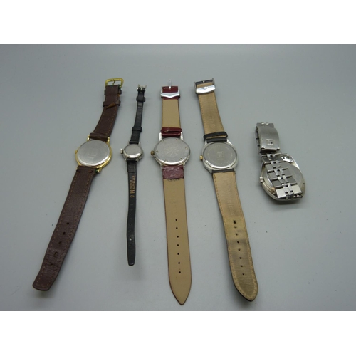 1124 - Four gentleman's Tissot wristwatches and a lady's Tissot wristwatch