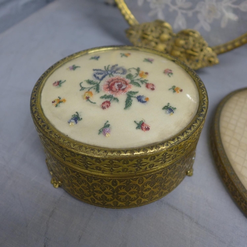 1137 - A collection of trinket pots, a tray, a hand mirror and a brush, all with embroidery **PLEASE NOTE T... 