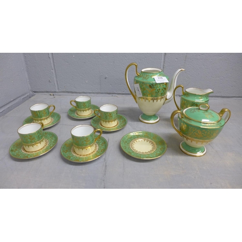 1146 - An Aynsley green, gold and white part coffee set comprising five cups, six saucers, cream and sugar ... 