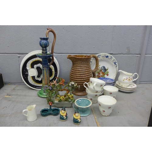 1201 - Four boxes of china and other ceramic items including figurines and a majolica candle holder with se... 