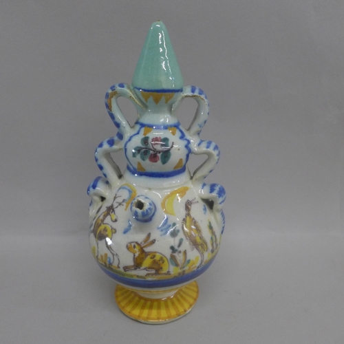 616 - A 19th Century faience drinking vessel, base a/f (restored), 21.5cm