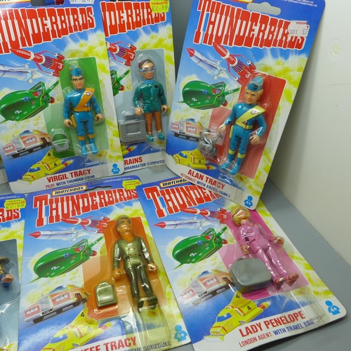 628 - Nine Matchbox Thunderbirds figures, in packets