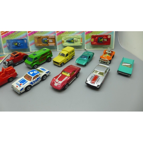 634 - Six Tins' Toys model vehicles in packets and other loose Matchbox model vehicles