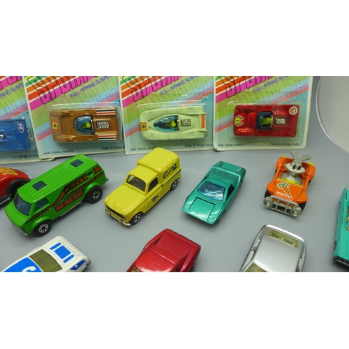 634 - Six Tins' Toys model vehicles in packets and other loose Matchbox model vehicles