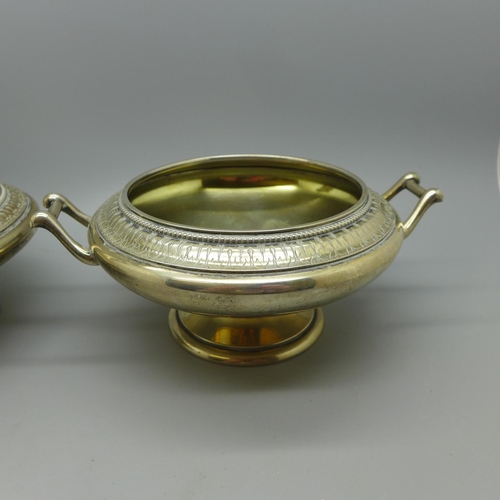 637 - A continental silver plated lidded pot, 21cm and a similar bowl, both marked J.C.K. and with one oth... 