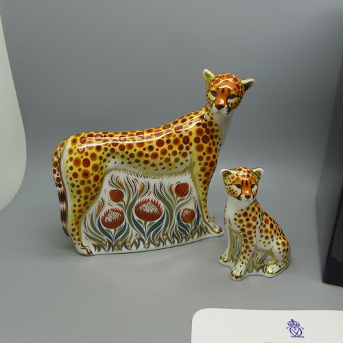 649 - Two Royal Crown Derby paperweights - Cheetah, 15cm, with gold stopper and box and a Cheetah Cub with... 