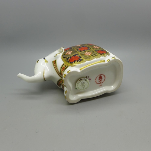 652 - A Royal Crown Derby paperweight - Royal Crown Derby Paperweight - Elephant, 1128 pattern, trunk rais... 